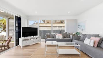 Casa conforto, vista para a praia | Área de estar