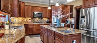 Lakeside 4-Bedroom Retreat with Kids’ Play Area & EV Charger