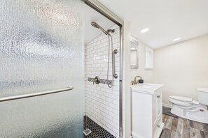 Shower, towels, soap, toilet paper