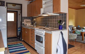 Fridge, stovetop, coffee/tea maker