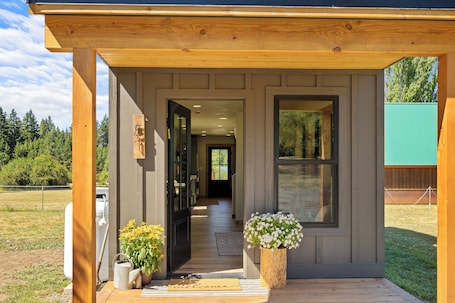 Exterior detail. Four Seasons Escape - Luxury cabin with A/C, minutes away from lake & trails!