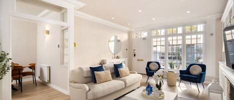 TV, fireplace, books