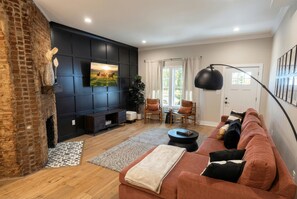 Smart TV, fireplace, books