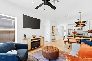 Smart TV, fireplace, books