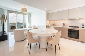 Microwave, dishwasher, coffee/tea maker, cookware/dishes/utensils