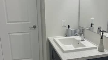 Hair dryer, towels, soap, toilet paper