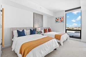 2 bedrooms, desk, iron/ironing board, travel crib