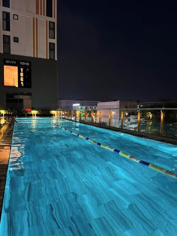 Outdoor pool, open 6:00 AM to 10:00 AM, pool umbrellas, sun loungers