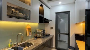 Condo, 2 Bedrooms, Balcony, Beach View | Private kitchen | Fridge, microwave, oven, stovetop