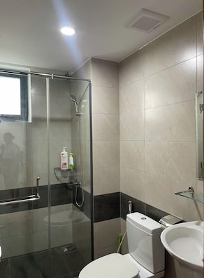 Shower, free toiletries, hair dryer, slippers