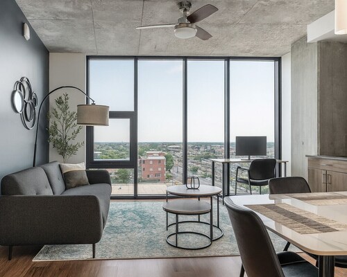 Modern 2BR Gem | Rooftop Pool + Workspaces