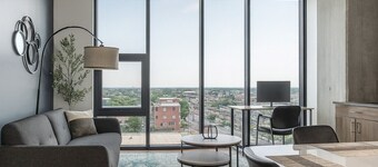 Modern 2BR Gem | Rooftop Pool + Workspaces