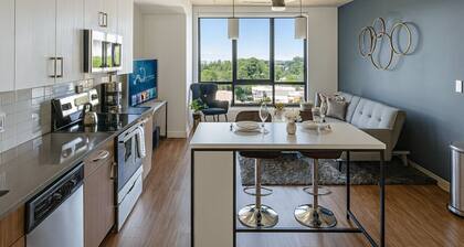 Bright 2BR Apt | Pool, Gym & Walkable Area