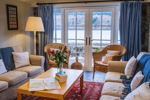 The Boat House - Magnificent views, timeless charm, & modern comfort.