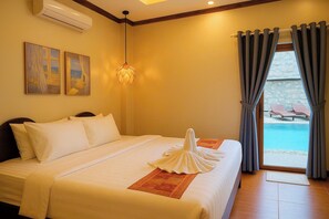 Deluxe szoba kétszemélyes vagy két külön ággyal, erkély, kilátással a medencére | Kilátás az erkélyről