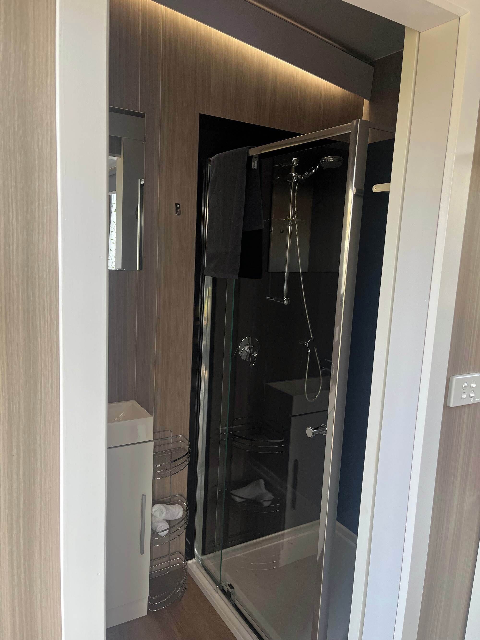 Shower, hair dryer, towels