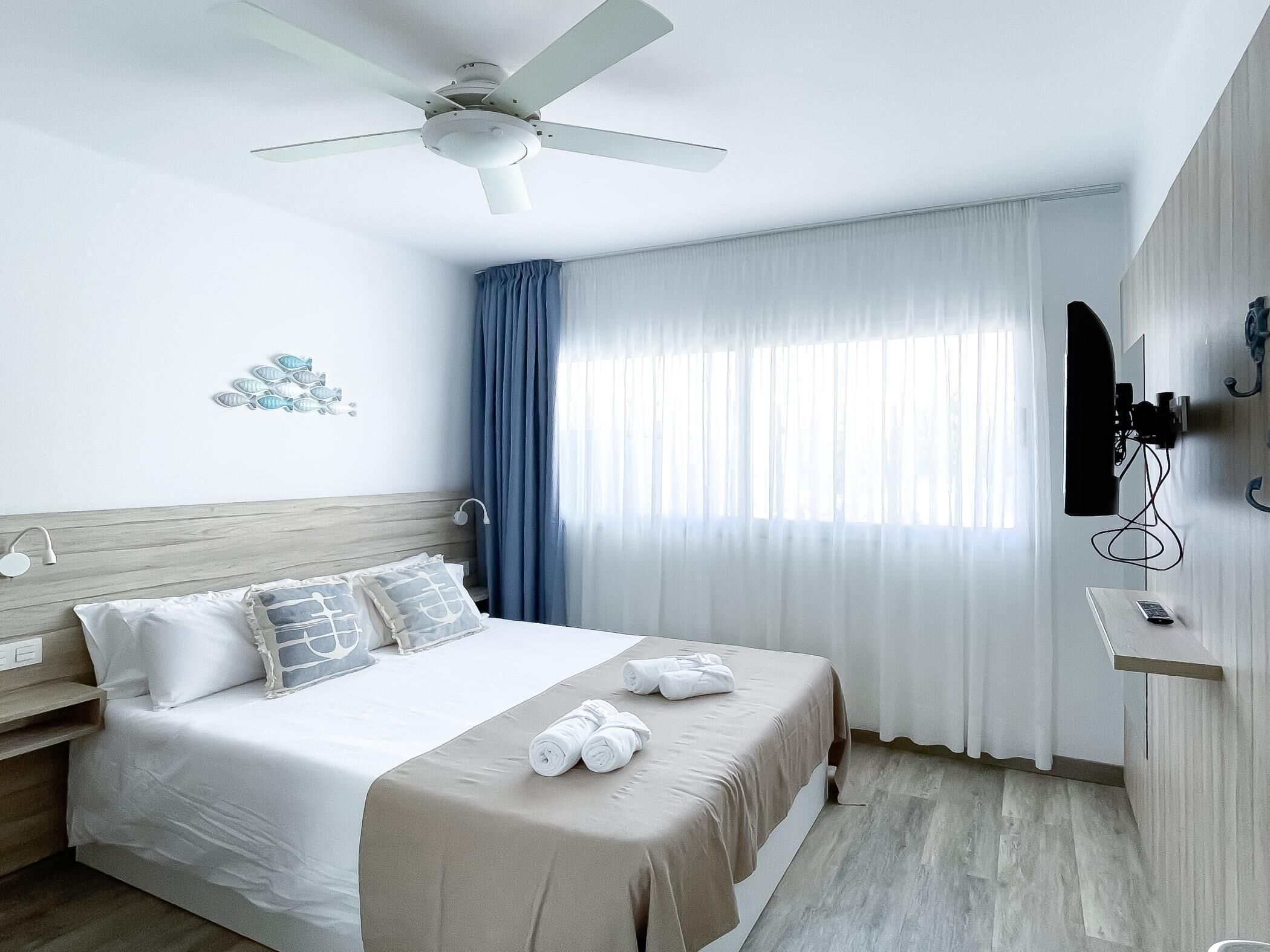 2 dormitorios, tabla de planchar con plancha, Internet y ropa de cama