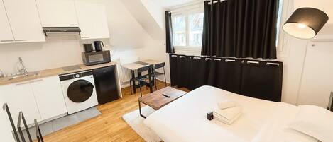 Fer et planche Ă repasser, literie fournie