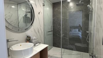 Shower, hair dryer, towels, soap
