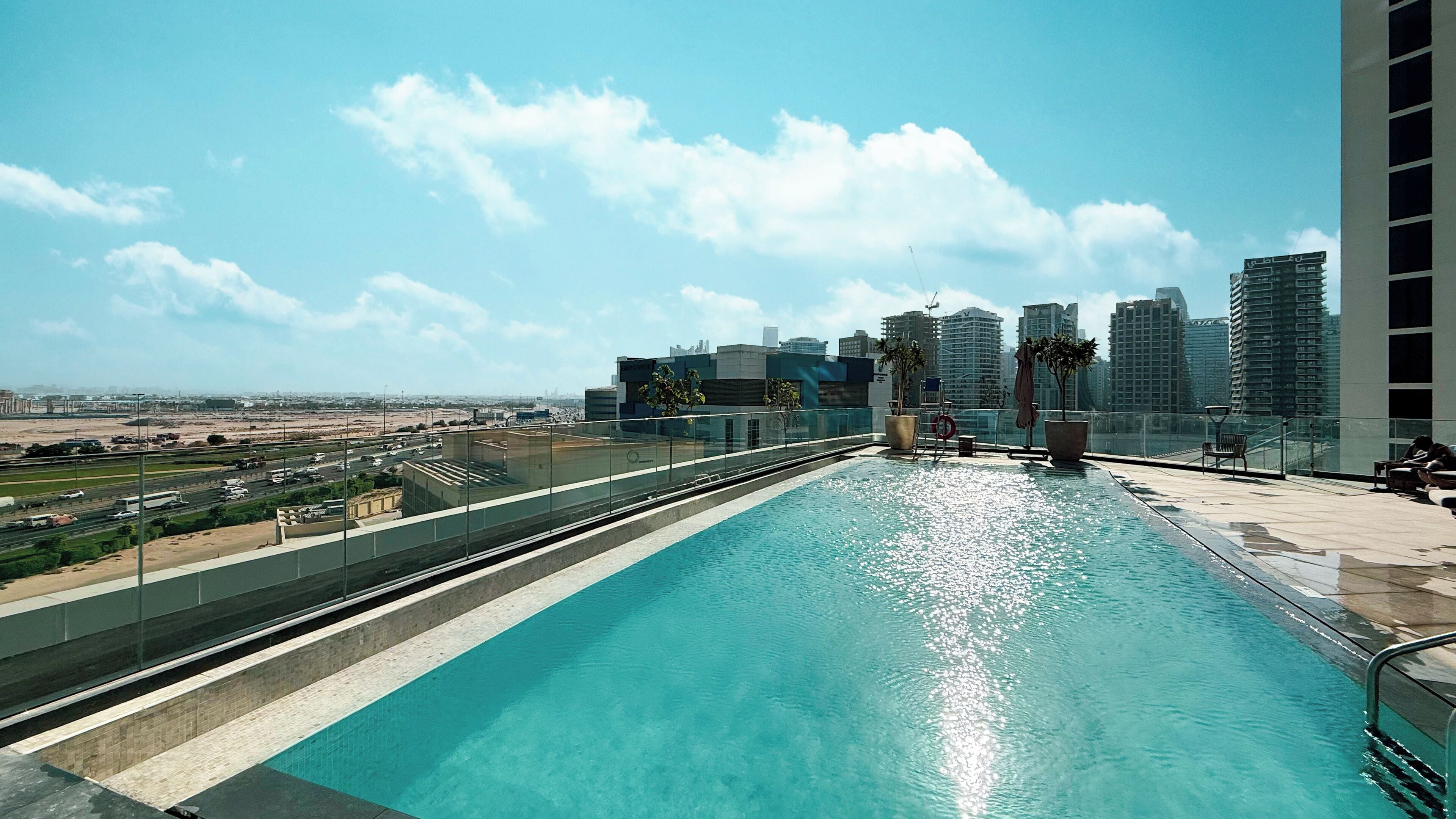 2 outdoor pools, open 7:00 AM to 10:00 PM, pool loungers