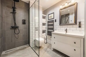 Shower, hair dryer, towels, soap