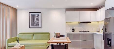 Fridge, microwave, stovetop, coffee/tea maker