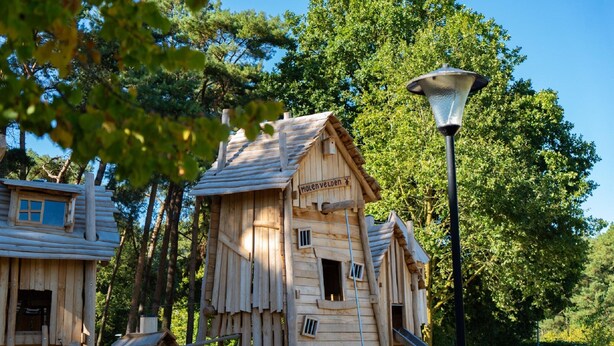 A wooden cabin with a sign reading "Molenveld". - Peaceful Stay Near Trails (Veldhoven)