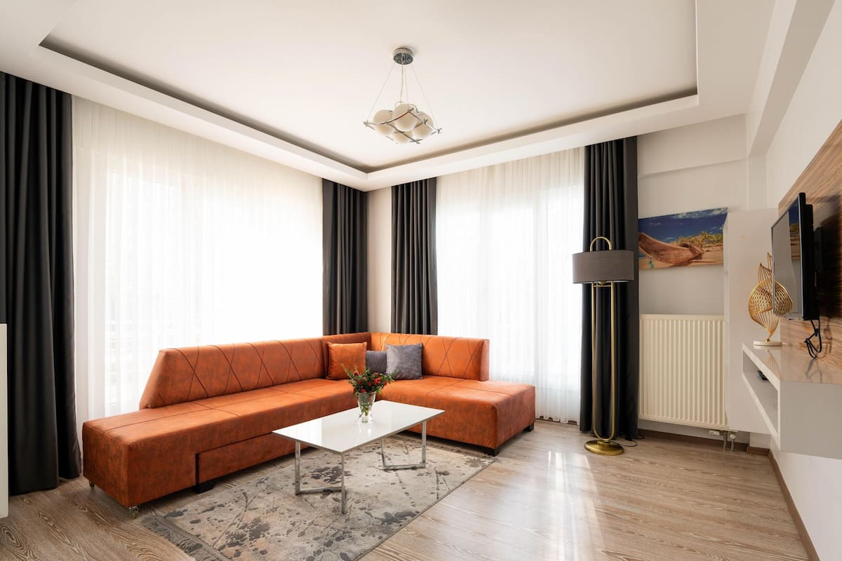 Deluxe Apartment, Balcony | Living area