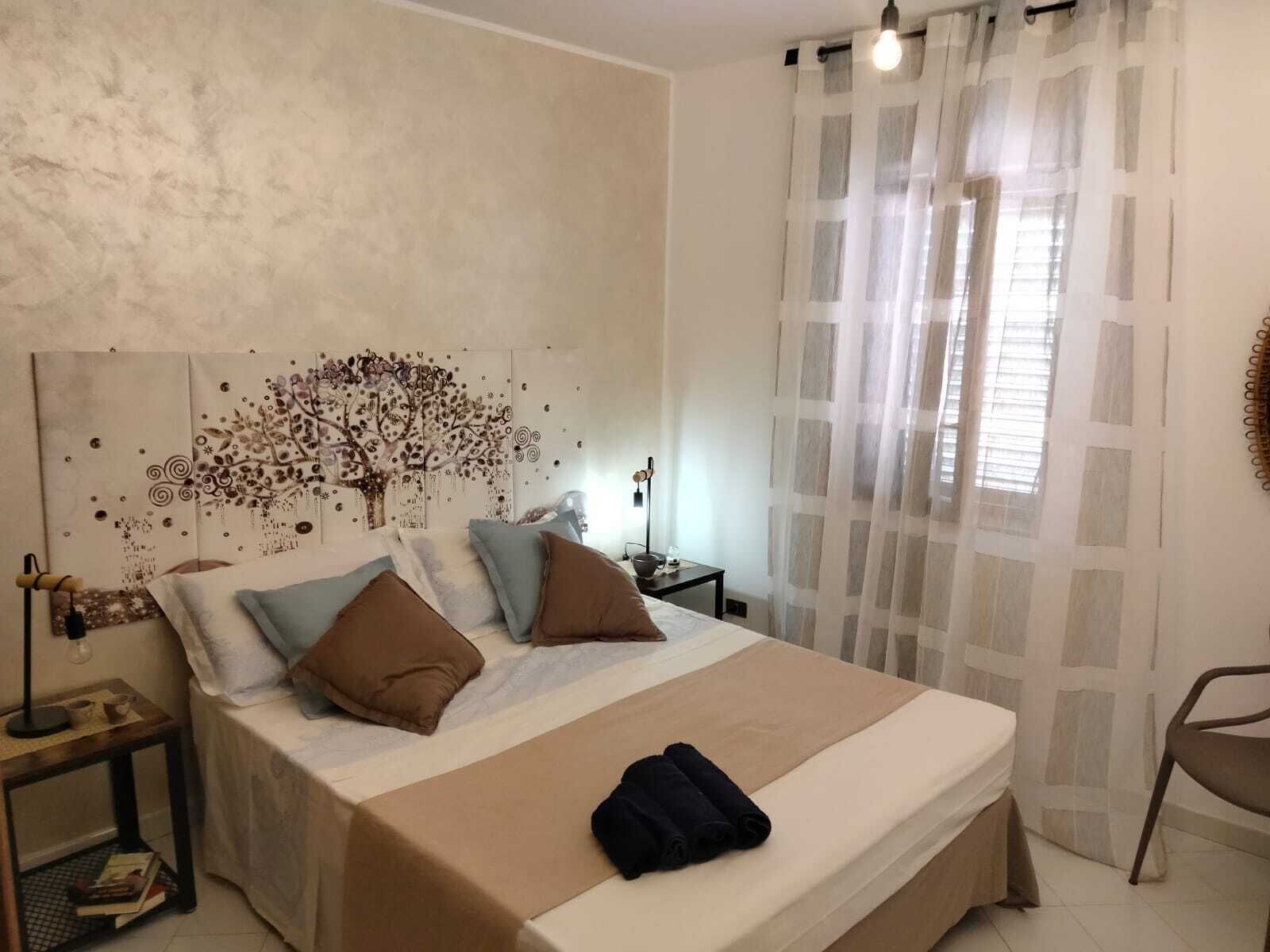 2 dormitorios, tabla de planchar con plancha, wifi gratis y ropa de cama