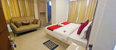 Habitación ejecutiva | Baño | Ducha, artículos de higiene personal gratuitos, toallas y jabón