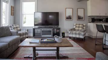 TV, fireplace, books, offices