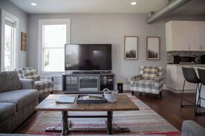 TV, fireplace, books, offices