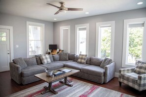 TV, fireplace, books, offices