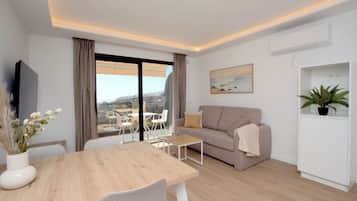Habitación Deluxe | Caja fuerte y ropa de cama