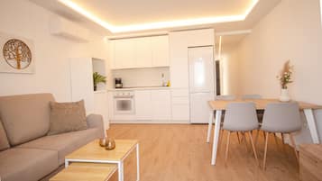 Habitación Deluxe | Caja fuerte y ropa de cama