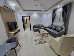 Apartment, Multiple Beds, Bathtub Grab Bars, Housekeeping | Living area - Al Jawhara Park 4 (Hafr Al Batin)