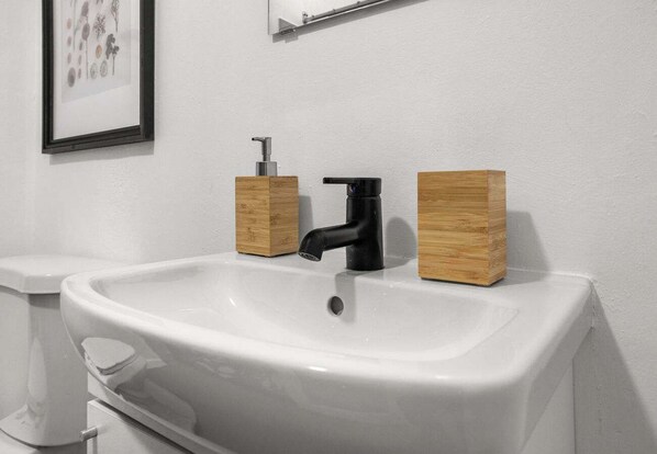 Modern sink with bamboo soap dispenser