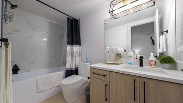 Eco-friendly toiletries, hair dryer, towels, soap