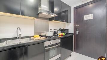 Luxury Studio, Balcony, City View | Iron/ironing board, free WiFi
