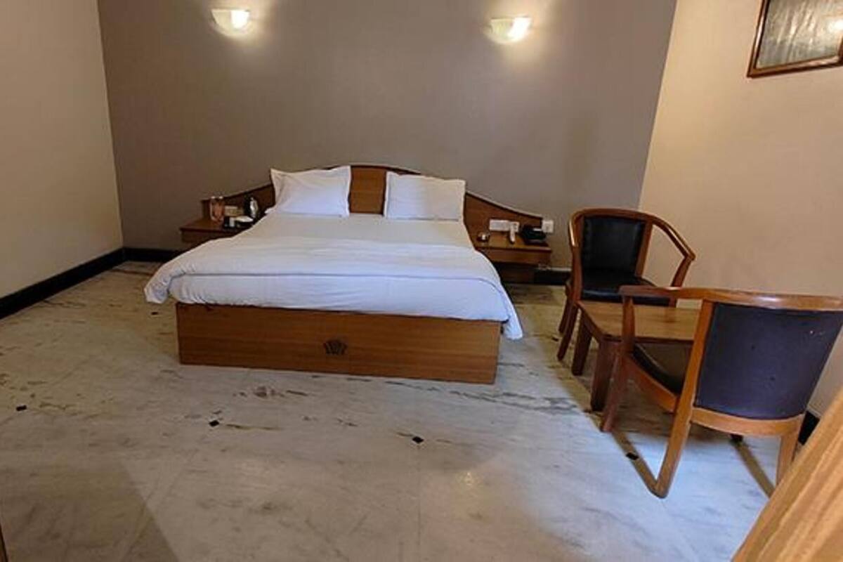 华丽客房 | 埃及棉床单、高档床上用品、客房内保险箱、免费 WiFi