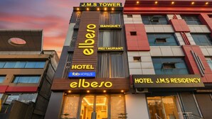 A hotel named 'elboso' with 'J.M.S Tower' signage, a 'Banquet' and 'Restaurant' on the upper floors, and 'fabHOTELS' branding. - Fabhotel Elbeso (Dera Bassi)
