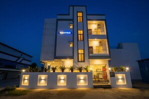 A modern hotel with a flat roof, multiple floors, and a prominent 'Tab Hotels' sign. - Fabhotel Casa (Nagpur)