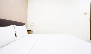 Egyptian cotton sheets, premium bedding, in-room safe, free WiFi - Fabhotel Infinity Rooms & Banquet (Surat)