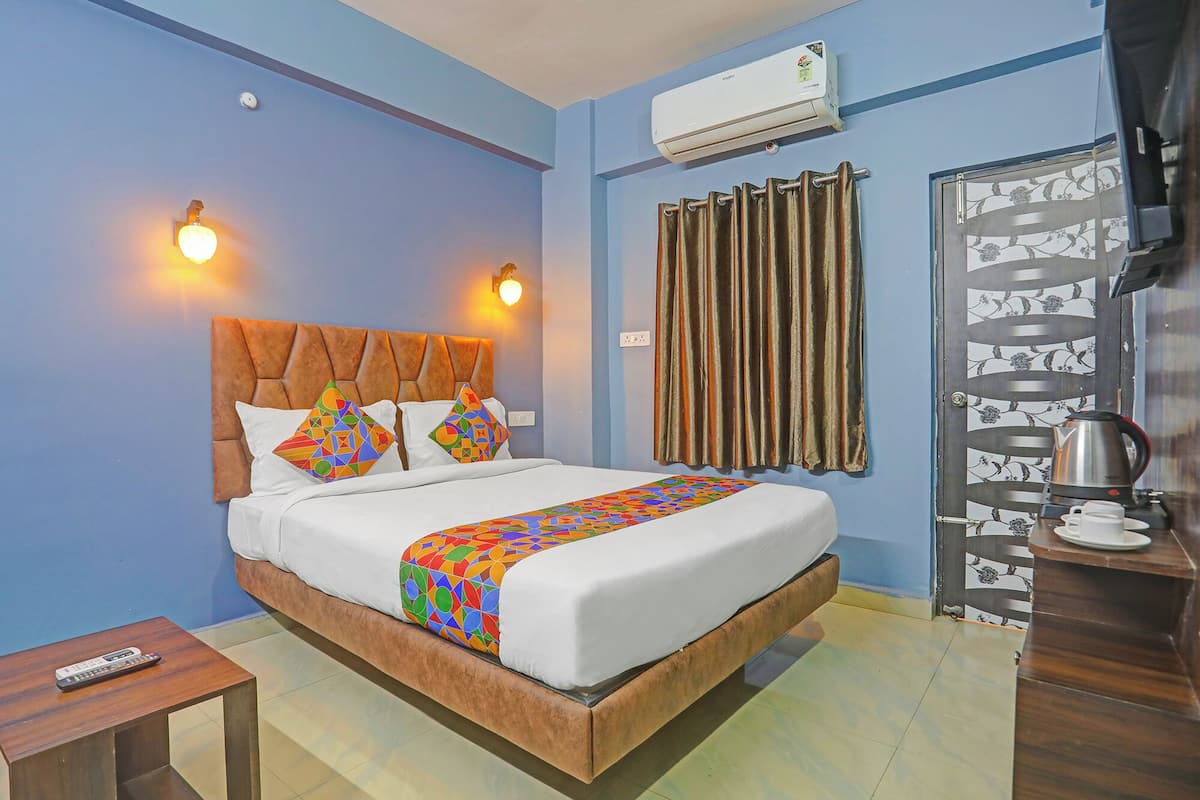 Deluxe kamer | Lakens van Egyptisch katoen, luxe beddengoed, een kluis op de kamer