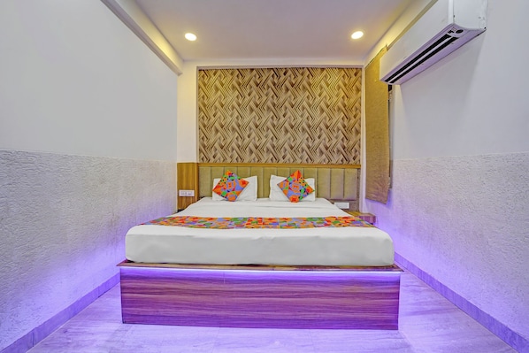 Deluxe kamer | Lakens van Egyptisch katoen, luxe beddengoed, een kluis op de kamer