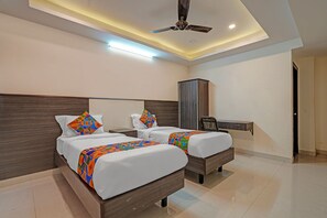 Egyptian cotton sheets, premium bedding, in-room safe, free WiFi - Fabhotel Sapthagiri Suites Inn (Bengaluru)