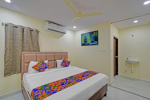 Egyptian cotton sheets, premium bedding, in-room safe, free WiFi - Fabhotel Srikara Grand Luxury Rooms (Hyderabad)