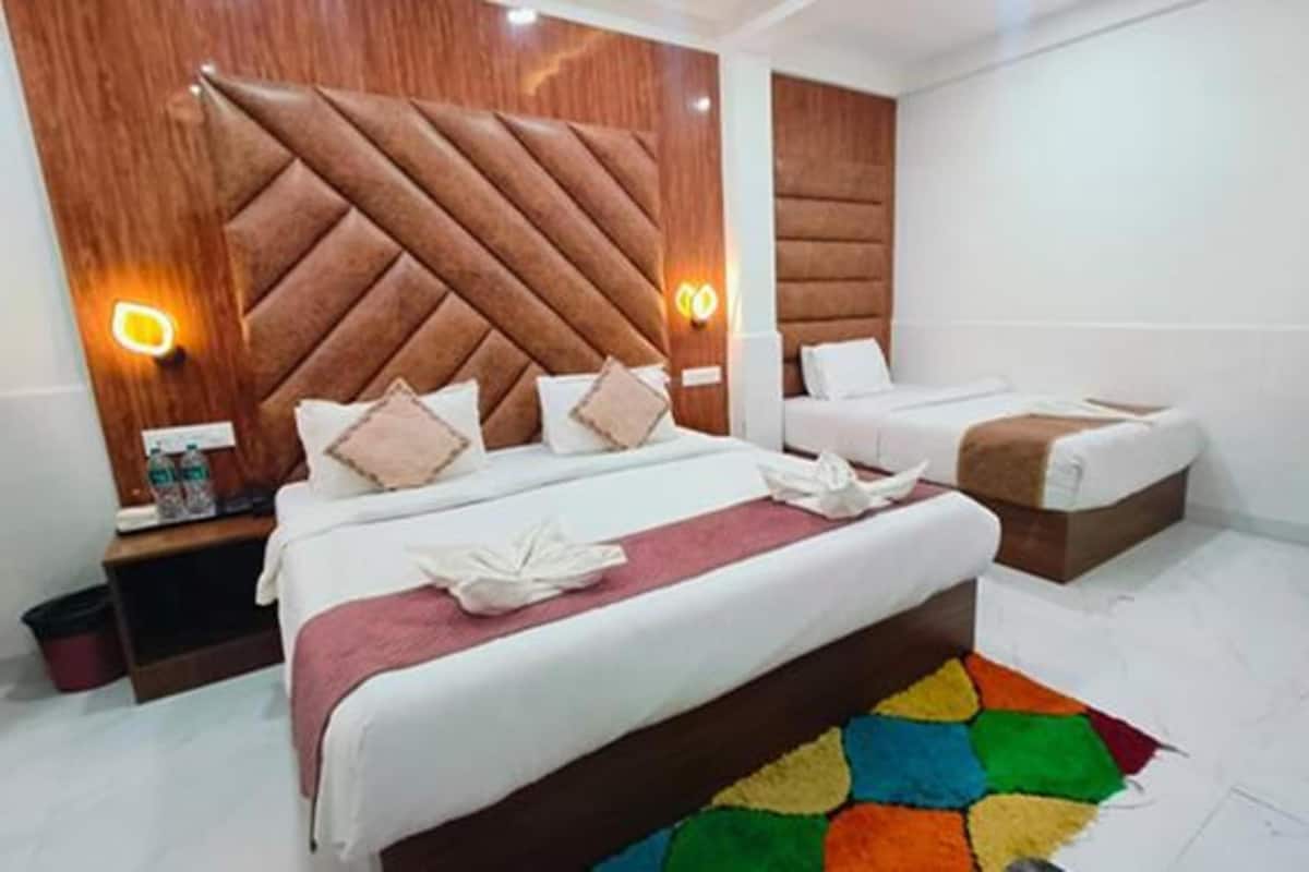 Habitación familiar | Sábanas de algodón egipcio y ropa de cama de alta calidad