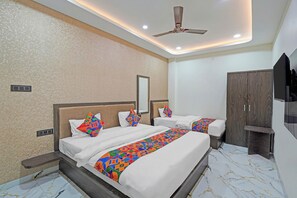 Habitación familiar | Sábanas de algodón egipcio y ropa de cama de alta calidad 