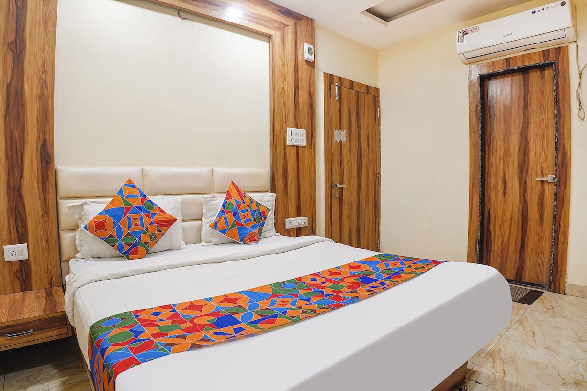 Deluxe kamer | Lakens van Egyptisch katoen, luxe beddengoed, een kluis op de kamer